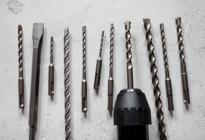 Carbide drill bits for drilling pearls