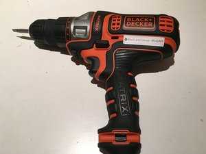 4. Are there any safety precautions I should take when changing the drill direction?